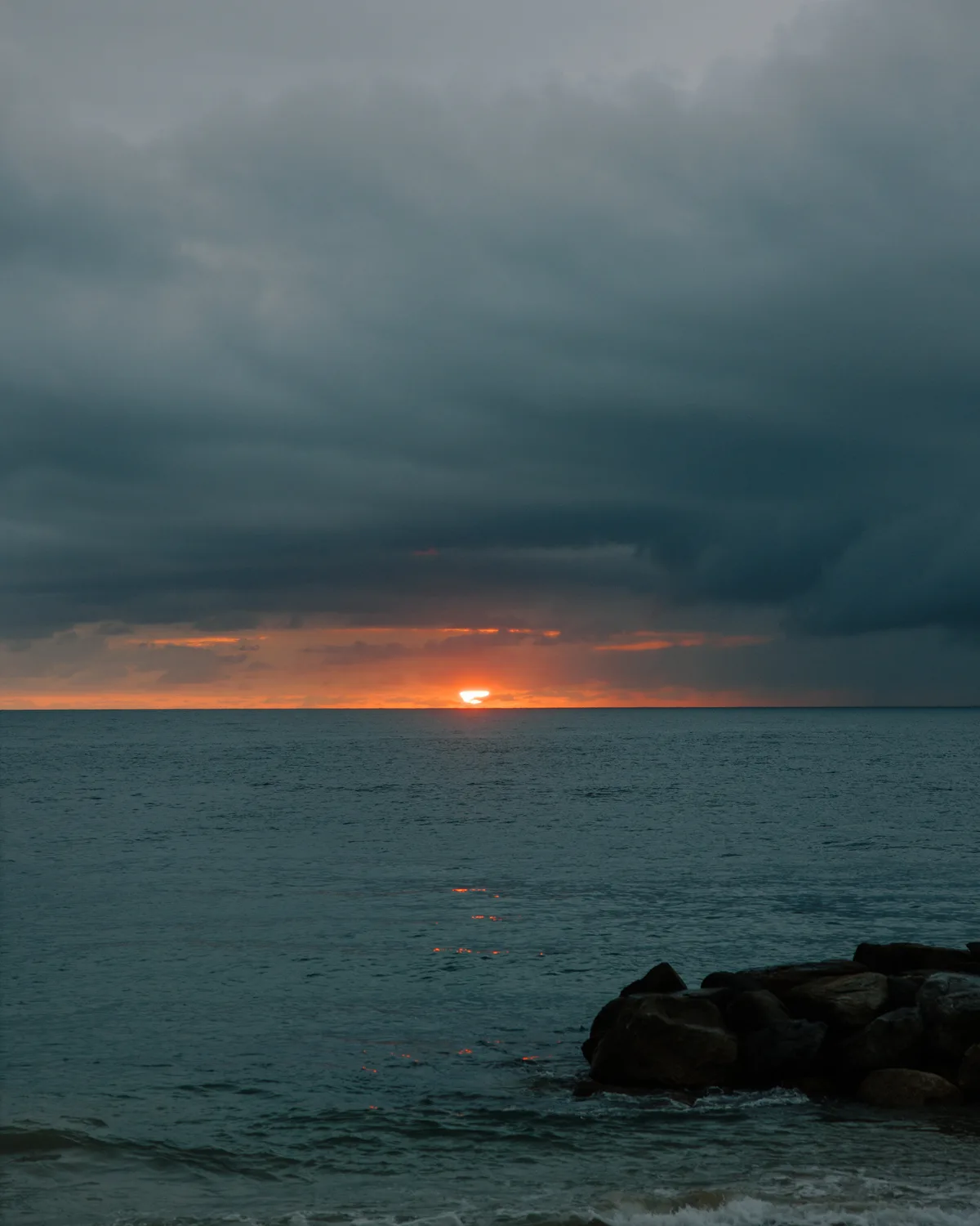 Storm clouds over the Pacific at sunset from Hotel Playa Fiesta Puerto Vallarta by Evgenia Kostiaeva